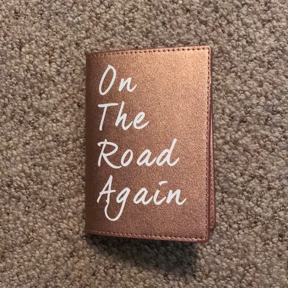 Passport holder and luggage tags. Never used